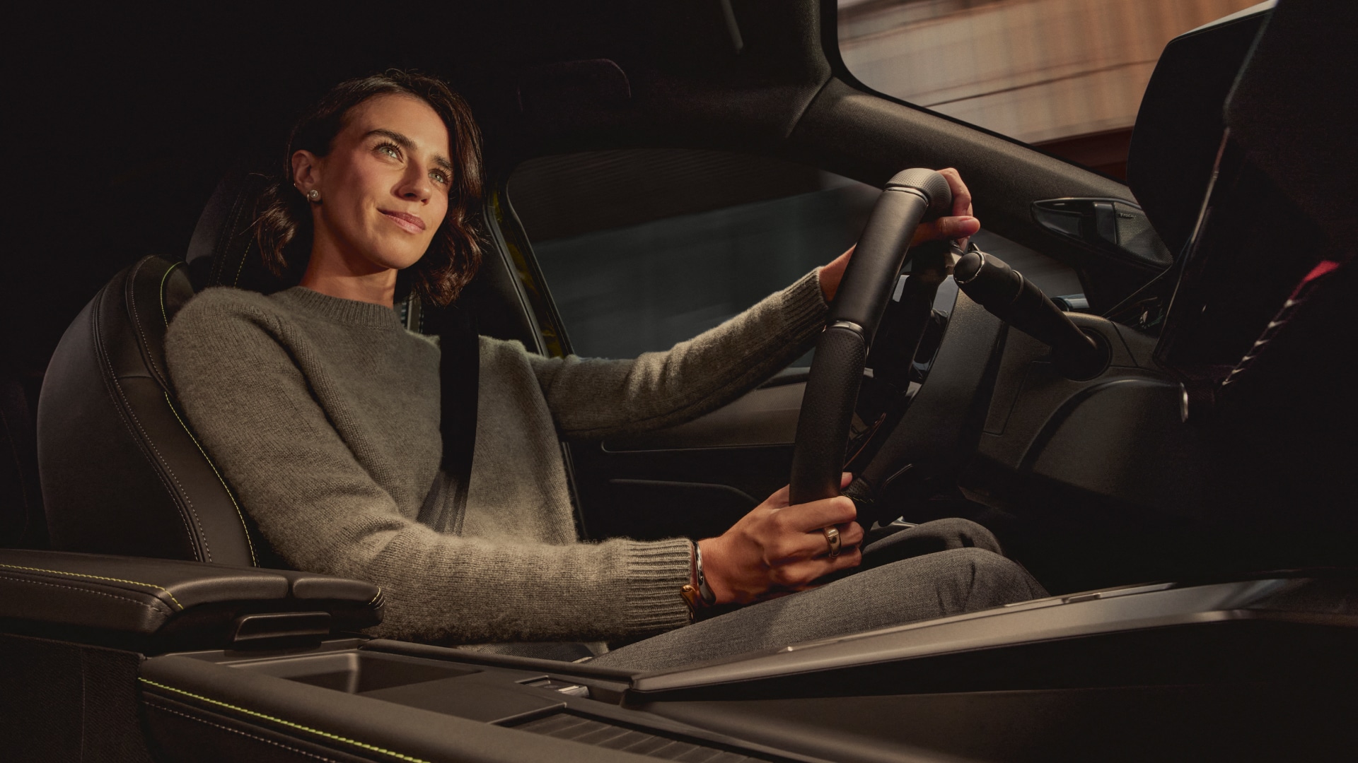 Woman driving a Peugeot